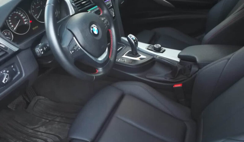BMW 320I modelo 	2016 lleno